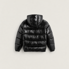 Women's black puffer jacket featuring a stylish attached hood, glossy quilted design, and convenient zip pockets, designed for a relaxed fit perfect for winter wear 6