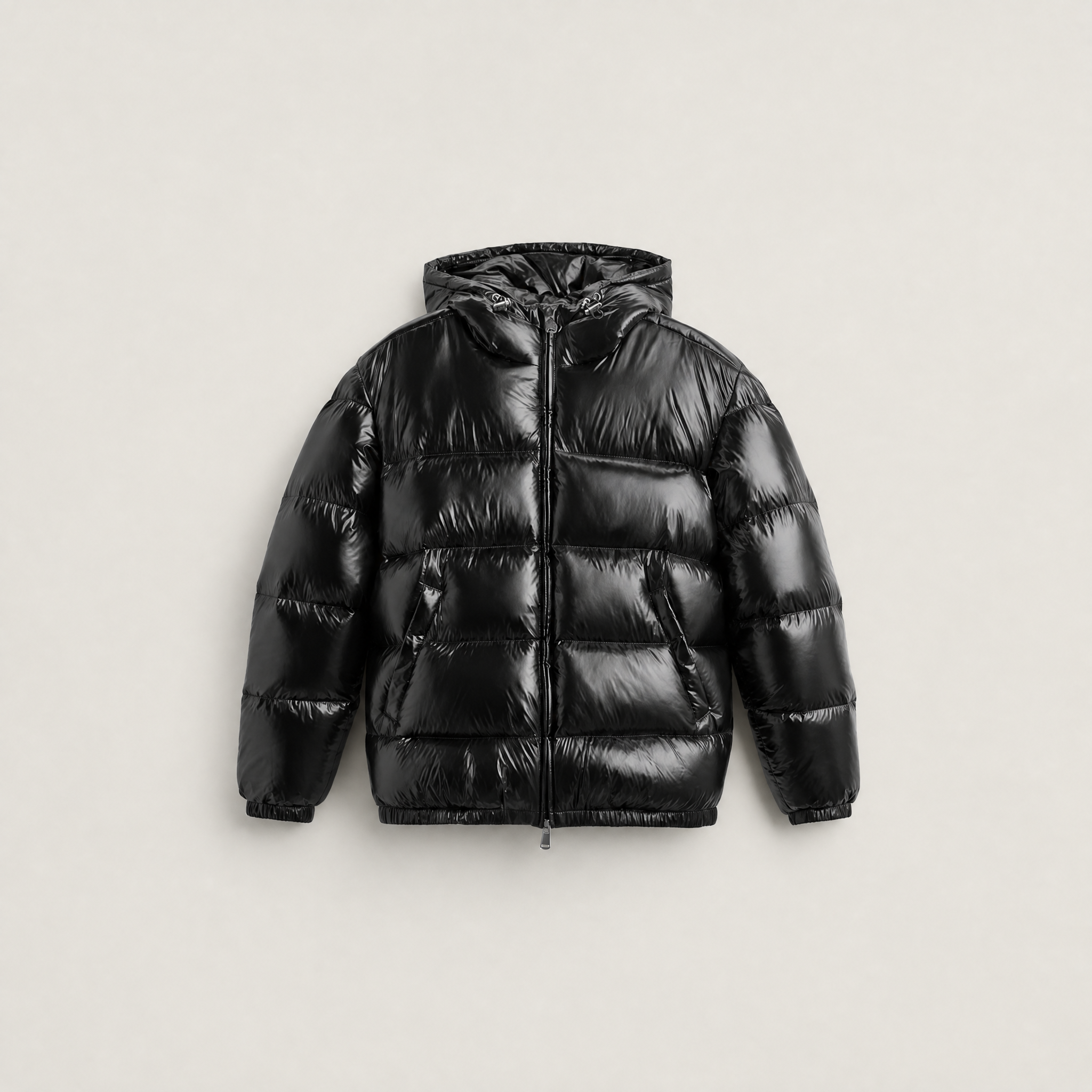 Women's black puffer jacket featuring a stylish attached hood, glossy quilted design, and convenient zip pockets, designed for a relaxed fit perfect for winter wear 7
