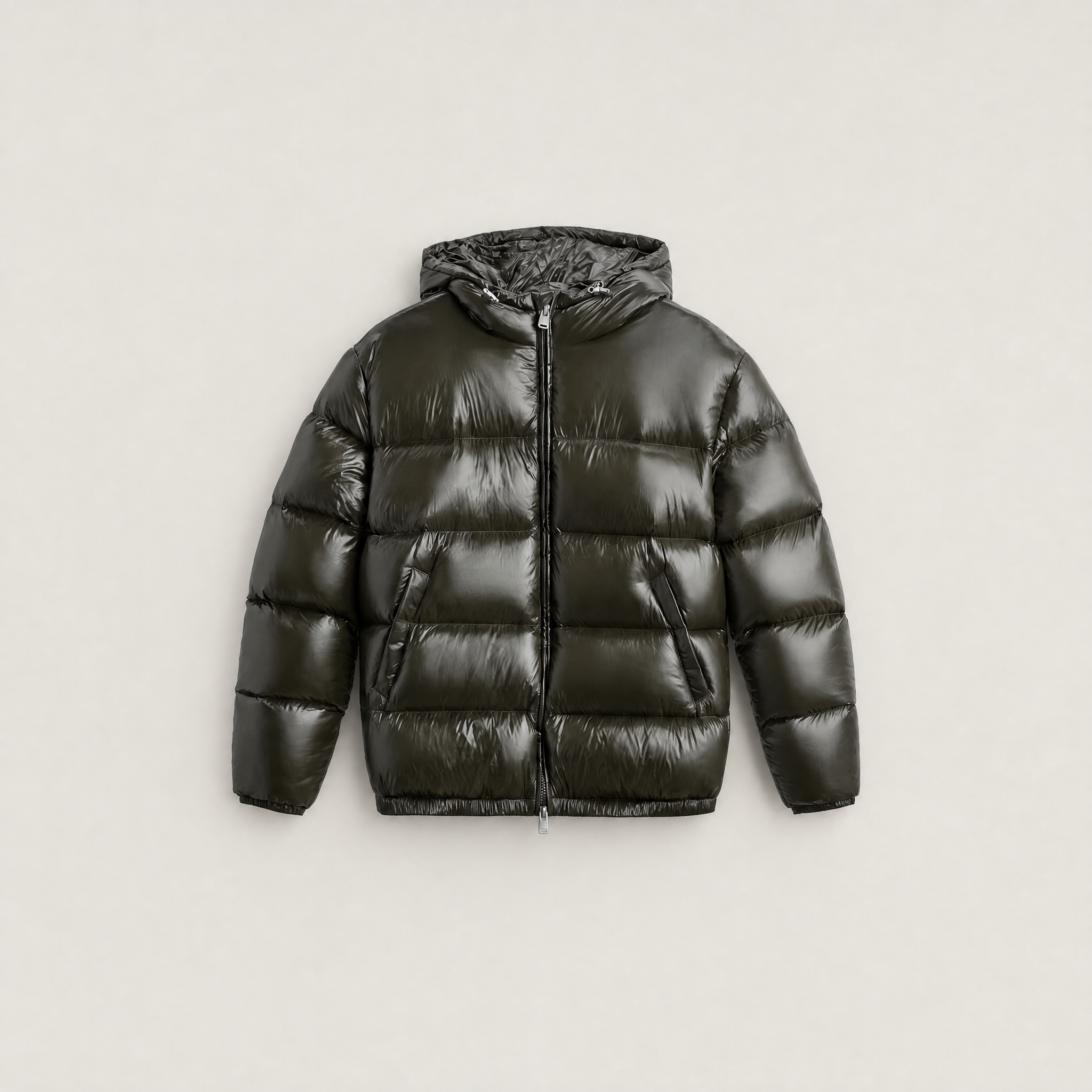 Women's black puffer jacket featuring a stylish attached hood, glossy quilted design, and convenient zip pockets, designed for a relaxed fit perfect for winter wear 8
