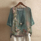 Women's vintage print blouse featuring a relaxed fit, lightweight and breathable fabric, perfect for a boho style look. 0