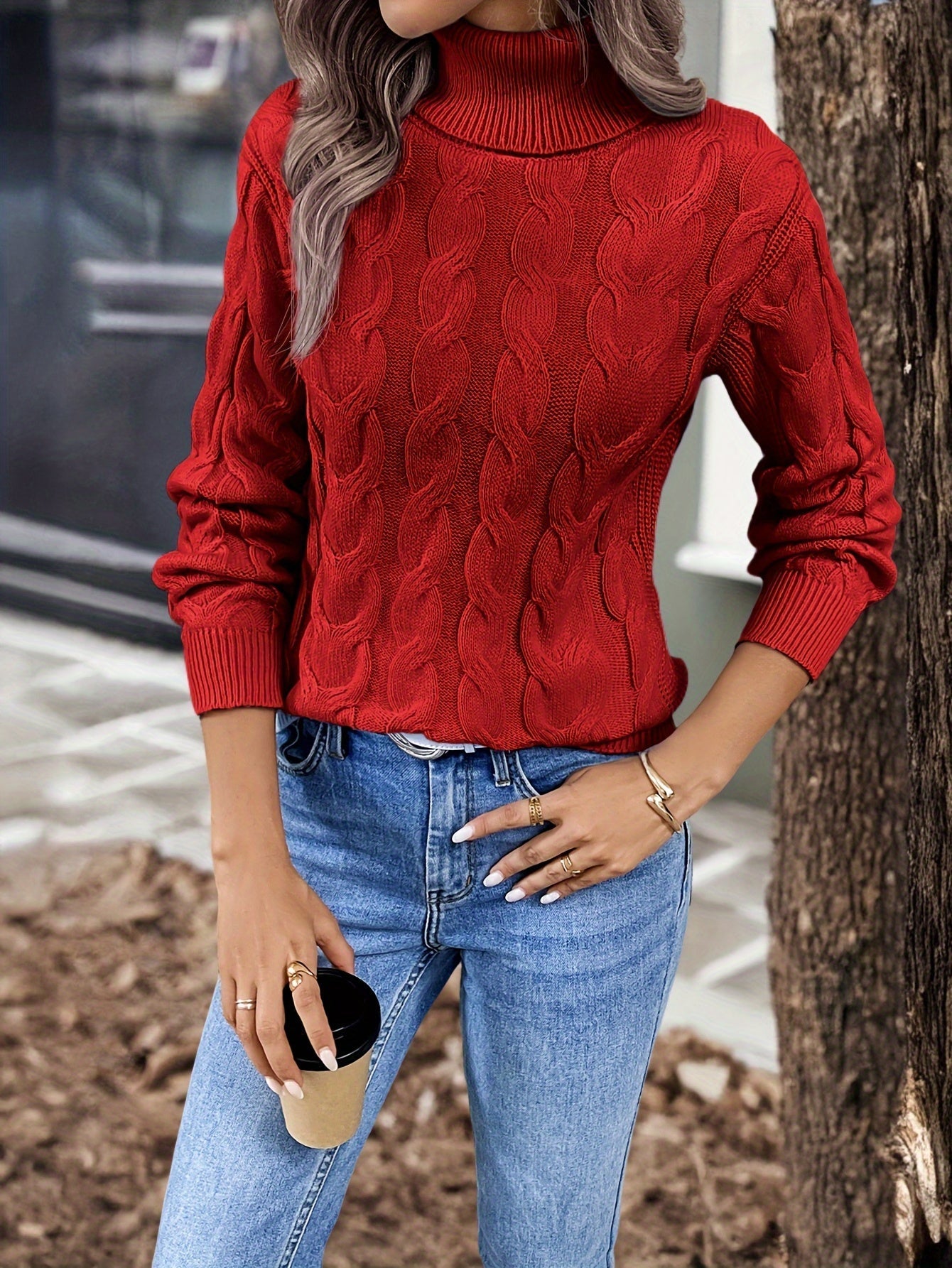 Women's cable-knit turtleneck sweater featuring a relaxed fit, perfect for cozy warmth during autumn and winter seasons. 5
