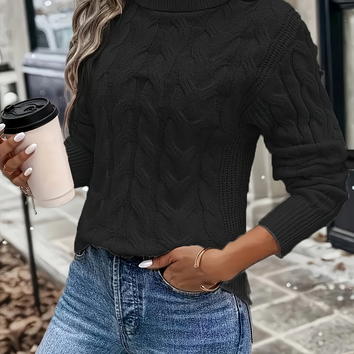 Women's cable-knit turtleneck sweater featuring a relaxed fit, perfect for cozy warmth during autumn and winter seasons. 6