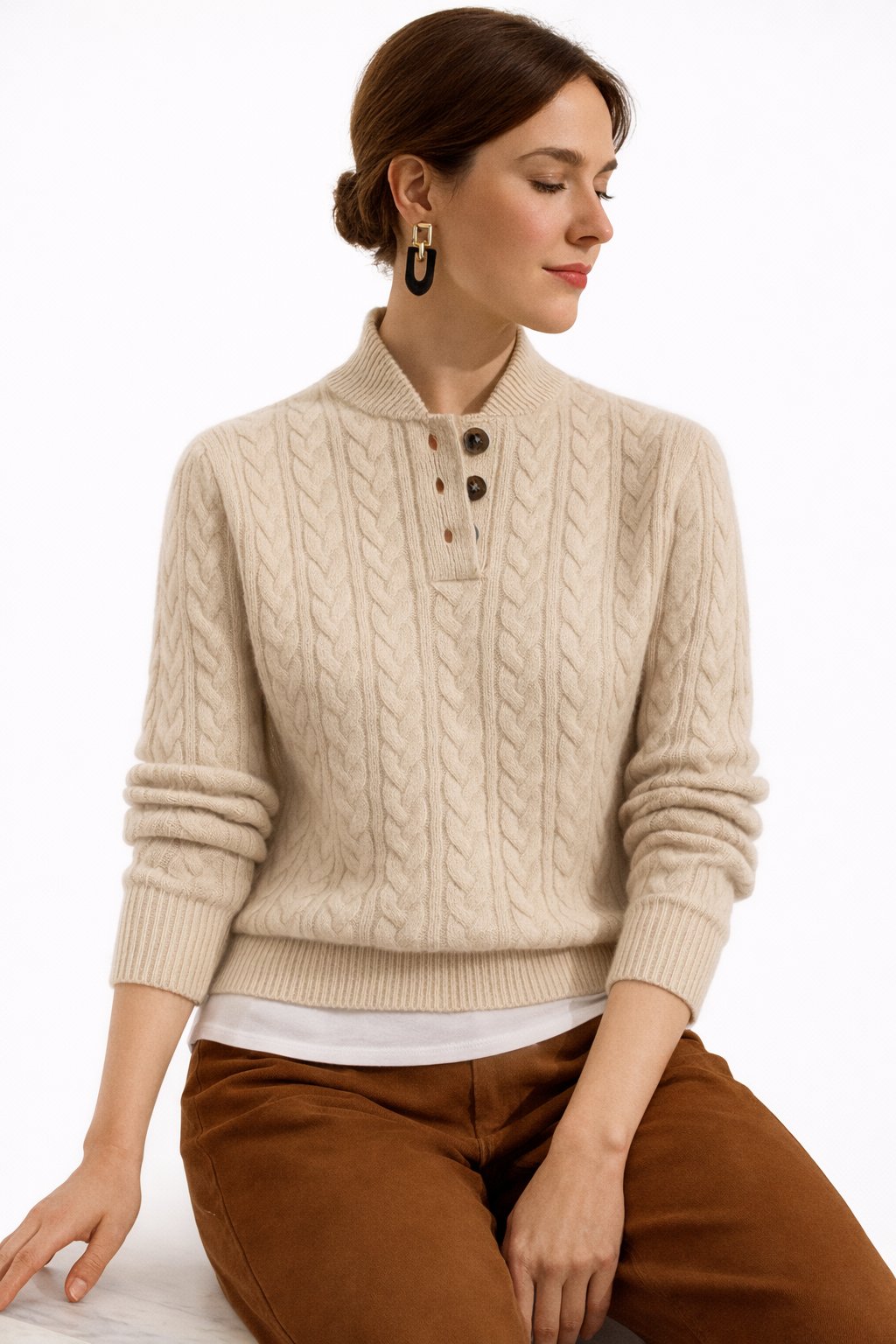 Women's cable knit sweater featuring a stylish button neck, designed for a relaxed fit in a soft wool-blend, perfect for both casual and business-cas 3