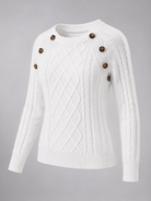 Women's cable knit sweater featuring button shoulder detail, crew neck design, and a stylish diamond knit pattern in a cozy and fashionable look. 1