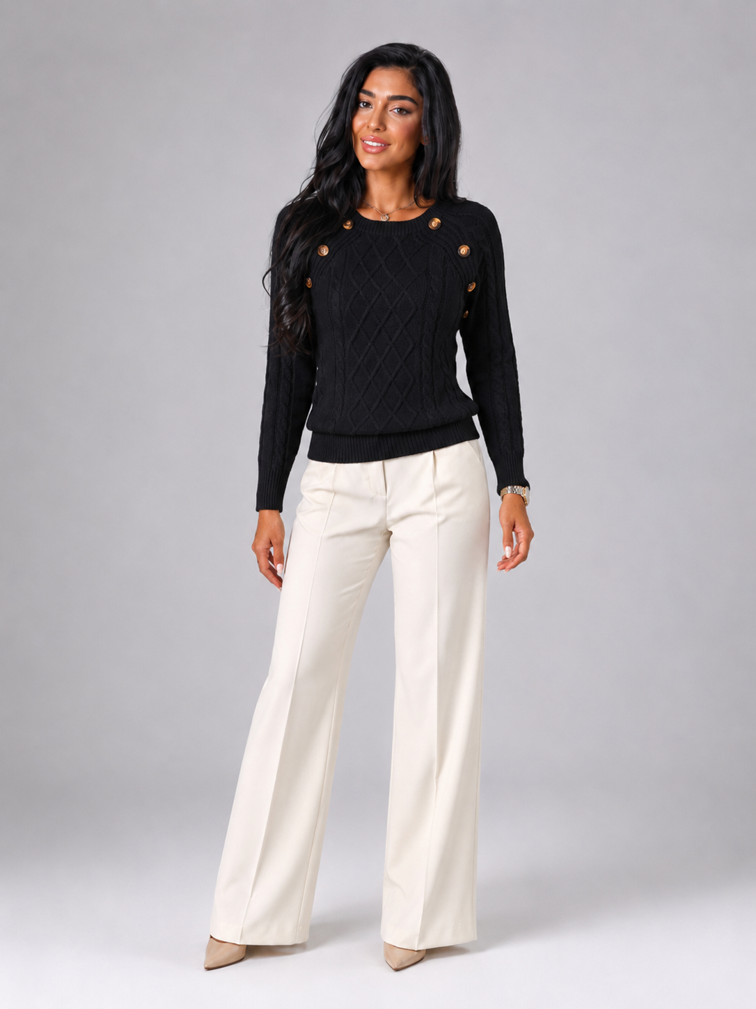 Women's cable knit sweater featuring button shoulder detail, crew neck design, and a stylish diamond knit pattern in a cozy and fashionable look. 3