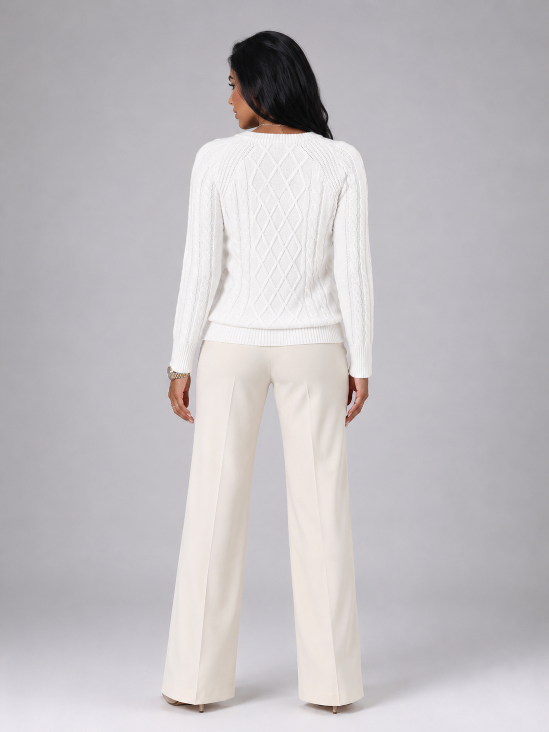 Women's cable knit sweater featuring button shoulder detail, crew neck design, and a stylish diamond knit pattern in a cozy and fashionable look. 8