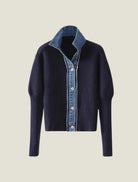 Women's cardigan sweater featuring a button-front closure and contrast trim, designed for comfortable layering in a soft knit fabric. 0