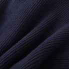 Women's cardigan sweater featuring a button-front closure and contrast trim, designed for comfortable layering in a soft knit fabric. 4