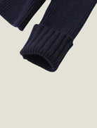Women's cardigan sweater featuring a button-front closure and contrast trim, designed for comfortable layering in a soft knit fabric. 5