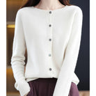 Women's black cardigan featuring a button front and relaxed fit, made from soft stretch knit fabric, perfect for layering and comfortable wear. 0
