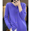 Women's black cardigan featuring a button front and relaxed fit, made from soft stretch knit fabric, perfect for layering and comfortable wear. 11
