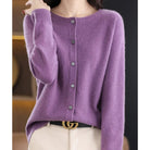Women's black cardigan featuring a button front and relaxed fit, made from soft stretch knit fabric, perfect for layering and comfortable wear. 12