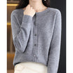 Women's black cardigan featuring a button front and relaxed fit, made from soft stretch knit fabric, perfect for layering and comfortable wear. 14