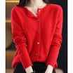 Women's black cardigan featuring a button front and relaxed fit, made from soft stretch knit fabric, perfect for layering and comfortable wear. 2