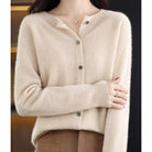 Women's black cardigan featuring a button front and relaxed fit, made from soft stretch knit fabric, perfect for layering and comfortable wear. 6