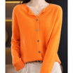Women's black cardigan featuring a button front and relaxed fit, made from soft stretch knit fabric, perfect for layering and comfortable wear. 8