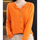 Women's black cardigan featuring a button front and relaxed fit, made from soft stretch knit fabric, perfect for layering and comfortable wear. 8