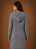 Women's black cardigan with hood and deep pockets, featuring a chunky cable knit design and mid-long duster length, perfect for layering in cooler weather. 5