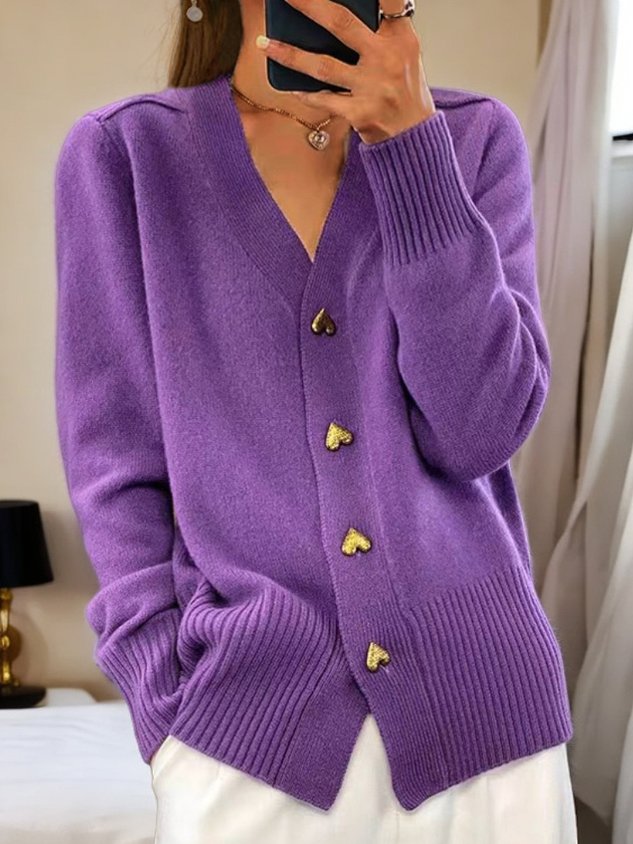 Women's lightweight cardigan featuring a secure fastener and soft knit blend, perfect for everyday wear and versatile layering options. 0