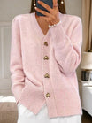 Women's lightweight cardigan featuring a secure fastener and soft knit blend, perfect for everyday wear and versatile layering options. 3