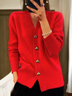 Women's lightweight cardigan featuring a secure fastener and soft knit blend, perfect for everyday wear and versatile layering options. 4
