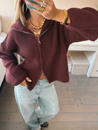 Women's oversized chunky knit cardigan featuring a zip-up front and stylish balloon sleeves, perfect for cozy and fashionable layering. 3