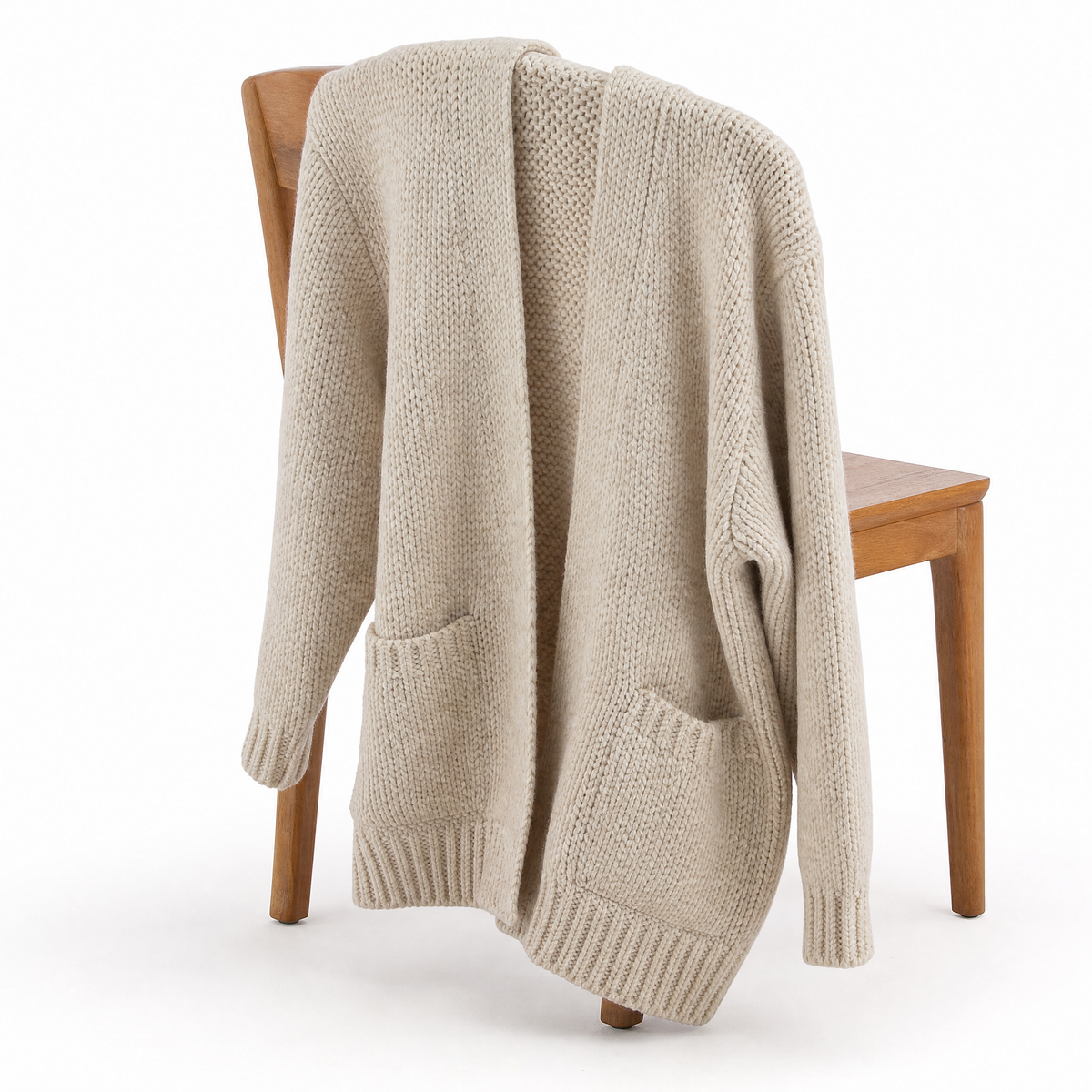 Women's chunky knit cardigan featuring an open front design, crafted from a soft wool-blend in oatmeal cream, designed for a relaxed fit. 4