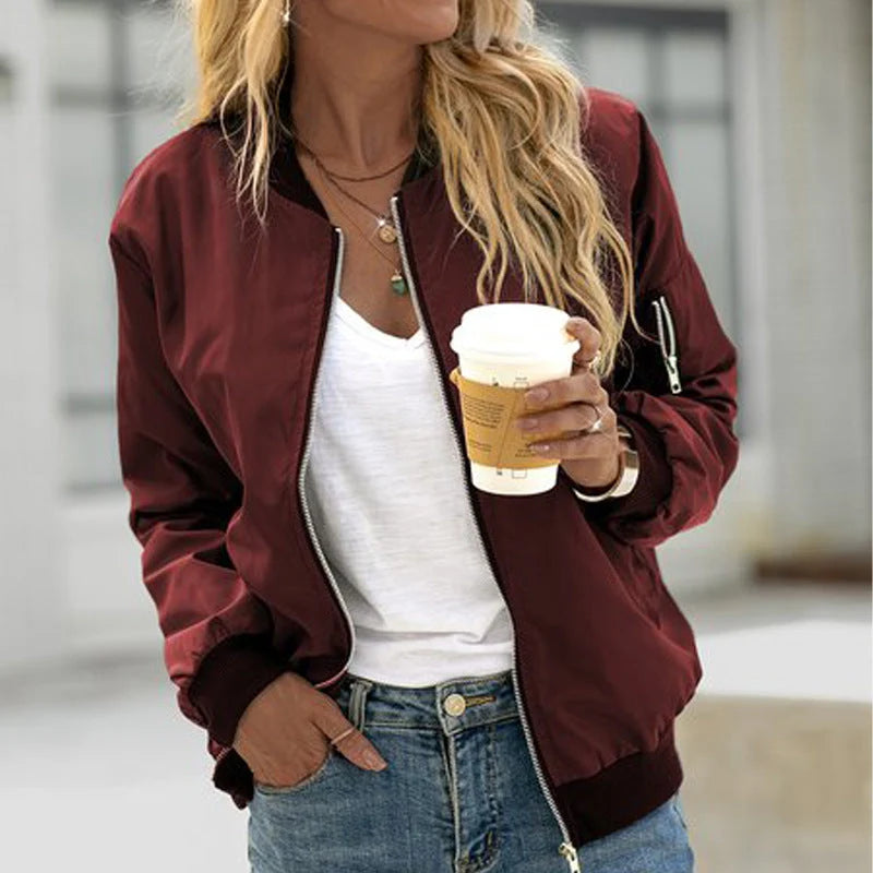 Women's Classic Bomber Jacket with Front Zipper in black, featuring a sleek design, comfortable fit, and versatile styling options for any occasion. 1