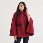 Women's cloak coat featuring an adjustable waist belt and relaxed batwing sleeves, designed for elegant layering and stylish comfort. 0