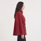 Women's cloak coat featuring an adjustable waist belt and relaxed batwing sleeves, designed for elegant layering and stylish comfort. 3