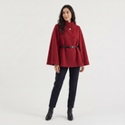 Women's cloak coat featuring an adjustable waist belt and relaxed batwing sleeves, designed for elegant layering and stylish comfort. 4