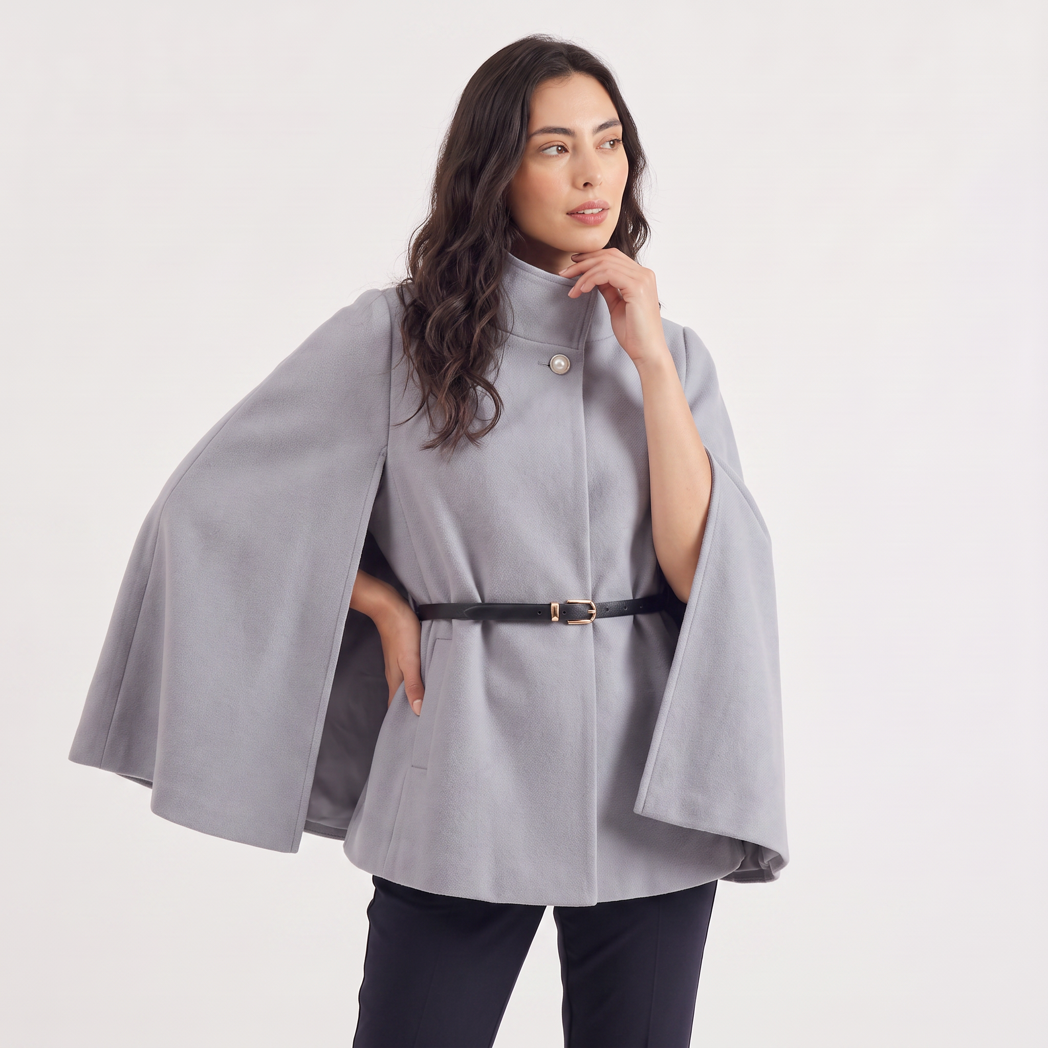 Women's cloak coat featuring an adjustable waist belt and relaxed batwing sleeves, designed for elegant layering and stylish comfort. 7