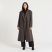 Women's oversized winter coat featuring a double-breasted closure and front pockets, designed for a relaxed fit and stylish warmth. 0
