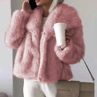 Women's cropped faux fur jacket with open front, featuring a plush textured design perfect for autumn and winter styling. 0
