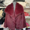 Women's cropped faux fur jacket with open front, featuring a plush textured design perfect for autumn and winter styling. 10