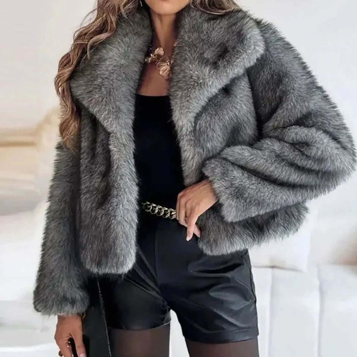 Women's cropped faux fur jacket with open front, featuring a plush textured design perfect for autumn and winter styling. 3