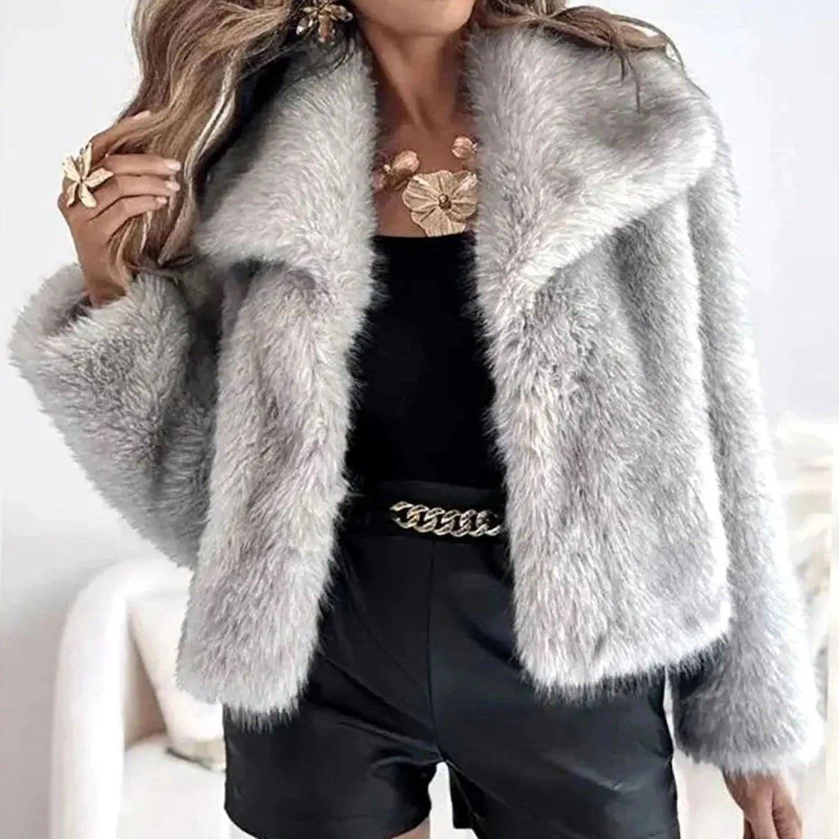 Women's cropped faux fur jacket with open front, featuring a plush textured design perfect for autumn and winter styling. 4