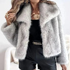 Women's cropped faux fur jacket with open front, featuring a plush textured design perfect for autumn and winter styling. 4
