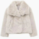 Women's cropped faux fur jacket with open front, featuring a plush textured design perfect for autumn and winter styling. 6