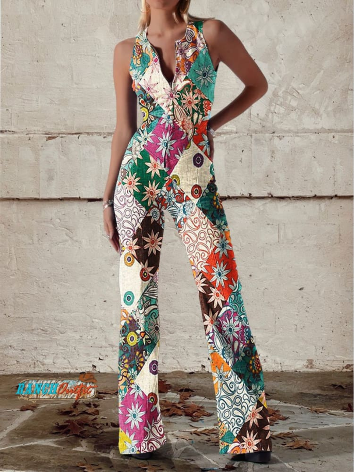 Women's denim jumpsuit featuring a floral print and wide-leg design, designed with a sleeveless V-neck for a stylish casual look. 0
