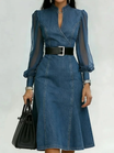 Women's denim midi dress featuring a belted waist and long sleeves, designed with an elegant V-neck in a stylish blue color, available in plus sizes. 0