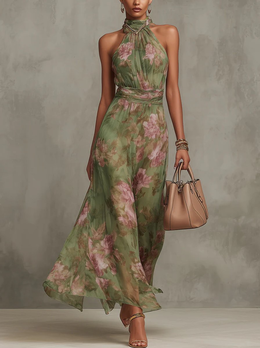 Women's floral halter-neck midi dress in lightweight chiffon, featuring a romantic print and A-line summer style, perfect for warm weather occasions. 0