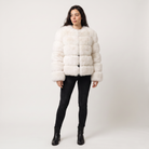 Women's faux fur jacket featuring a concealed fastening, designed for a relaxed fit and hip-length styling, perfect for fashionable layering in cool weather. 4