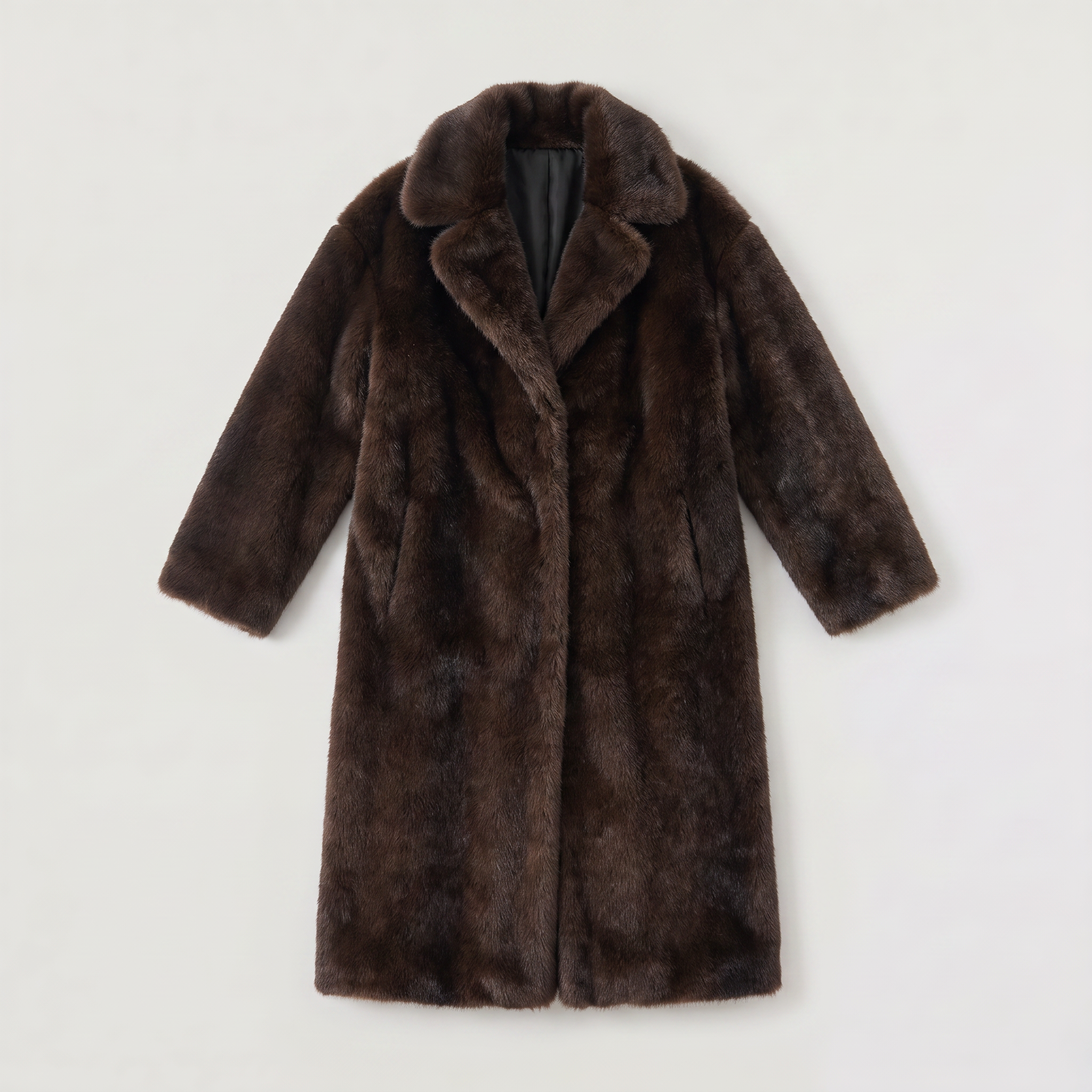 Women's faux fur trench coat featuring double-button fastening, side pockets, and a long relaxed fit, perfect for stylish winter outerwear. 3