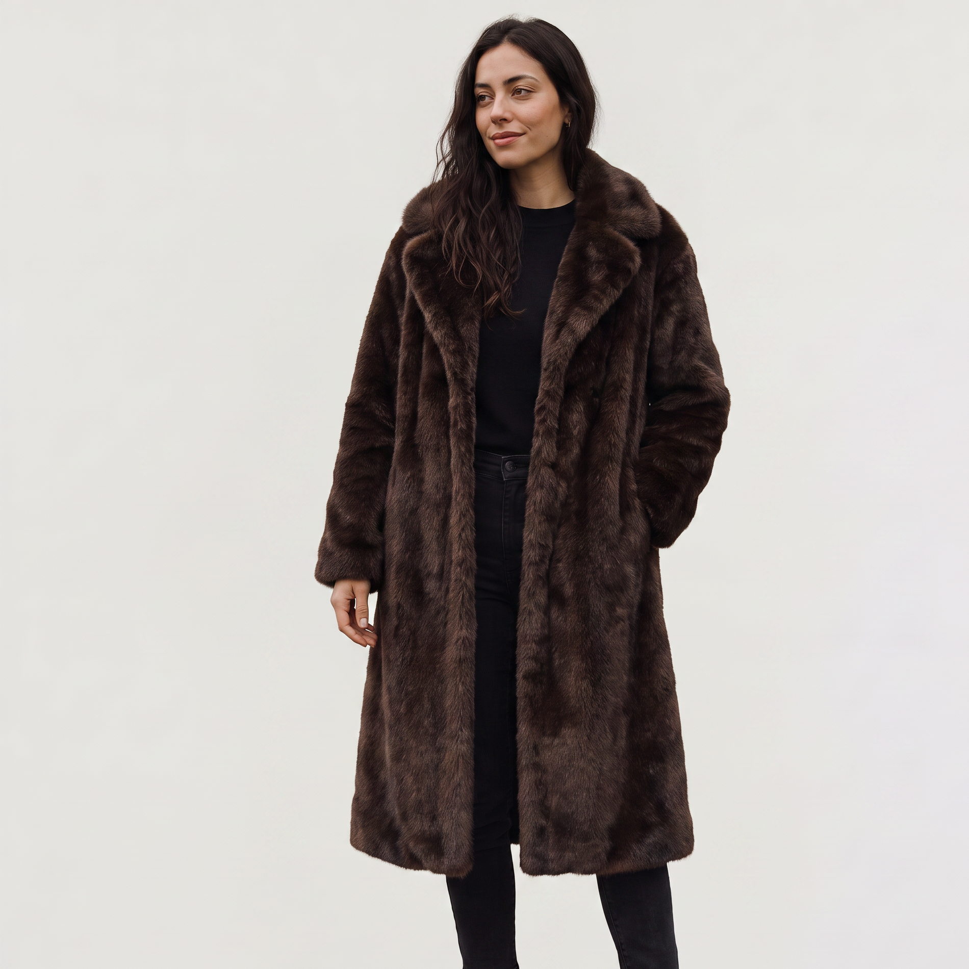 Women's faux fur trench coat featuring double-button fastening, side pockets, and a long relaxed fit, perfect for stylish winter outerwear. 6