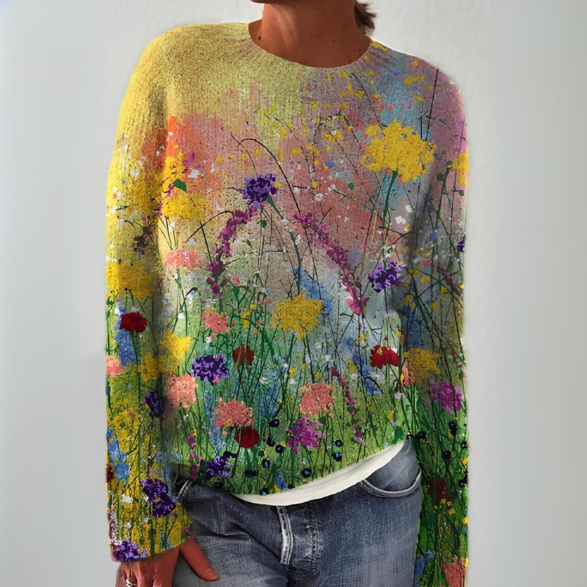 Women's floral knit sweater featuring long sleeves and a crew neck, designed for a cozy relaxed fit perfect for everyday style. 0