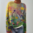 Women's floral knit sweater featuring long sleeves and a crew neck, designed for a cozy relaxed fit perfect for everyday style. 0