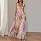 Women's floral maxi dress featuring a pleated skirt and square neckline, perfect for elegant summer events and weddings. 1