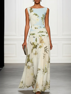 Women's floral maxi dress featuring a sleeveless design, perfect for summer weddings and formal events, made from elegant lightweight fabric. 0