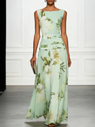 Women's floral maxi dress featuring a sleeveless design, perfect for summer weddings and formal events, made from elegant lightweight fabric. 1